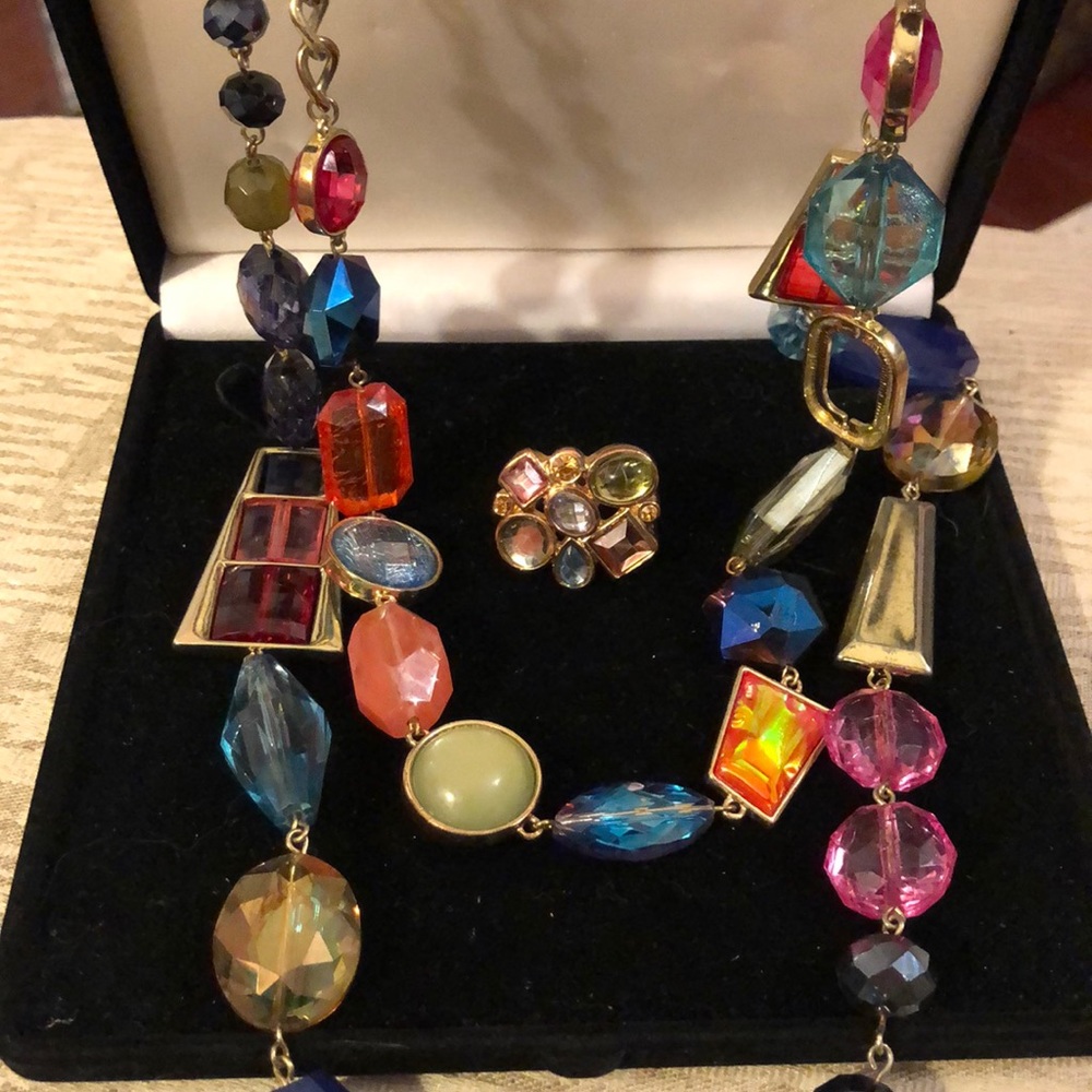 Multi color strands of bauble beads and a ring